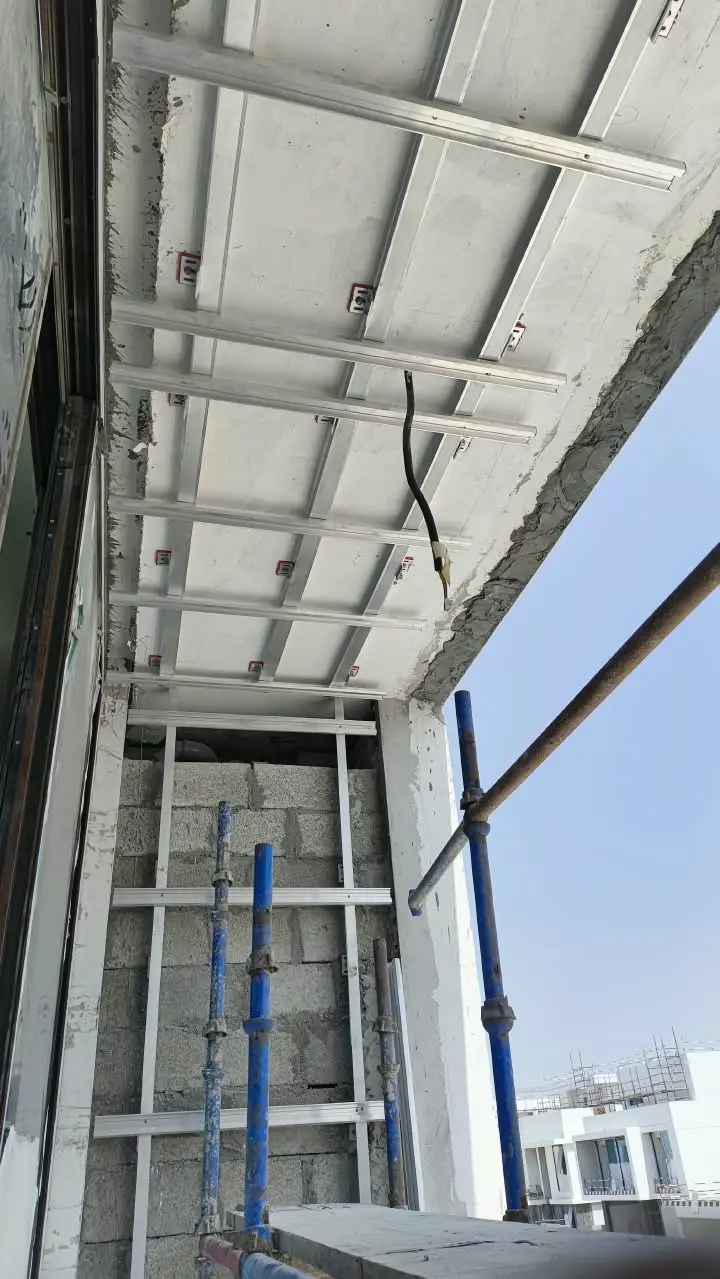 Detailed HPL ceiling framing and wall support structure during construction